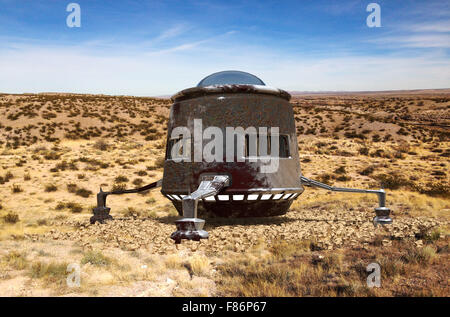 unidentified flying object in the desert Stock Photo