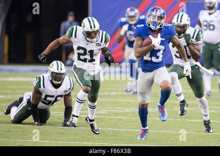 East Rutherford, New Jersey, USA. 6th Dec, 2015. New York Giants wide receiver Odell Beckham Jr. (13) runs with the ball past New York Jets free safety Marcus Gilchrist (21), cornerback Antonio Cromartie (31) and inside linebacker Demario Davis (56) on his way to a touchdown during the NFL game between the New York Jets and the New York Giants at MetLife Stadium in East Rutherford, New Jersey. Christopher Szagola/CSM/Alamy Live News Stock Photo