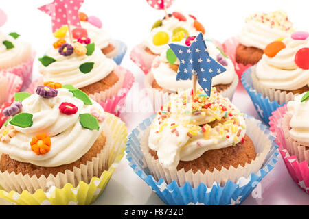 Cupcakes delicious and colorful decorated. Stock Photo