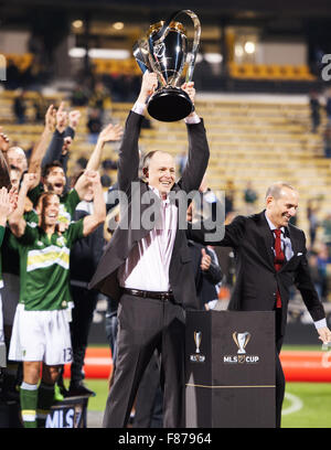 Columbus, Ohio, USA. 6th December, 2015. Portland Timbers Majority Owner Henry Merritt Paulson III lifts the the MLS Cup after the Timbers defeated Columbus Crew SC 2-1 in Columbus, Ohio. Brent Clark/Alamy Live News Stock Photo