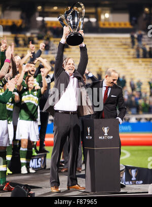 Columbus, Ohio, USA. 6th December, 2015. Portland Timbers Majority Owner Henry Merritt Paulson III lifts the the MLS Cup after the Timbers defeated Columbus Crew SC 2-1 in Columbus, Ohio. Brent Clark/Alamy Live News Stock Photo