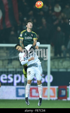 Modena, Italy. 6th Dec, 2015. Simone Romagnoli (Top) of AC Milan vies with Kevin Lasagna of Carpi during their Italian Serie A football match at the Braglia stadium in Modena, Italy, Dec. 6, 2015. The match ended with a 0-0 draw. Credit:  Alberto Lingria/Xinhua/Alamy Live News Stock Photo