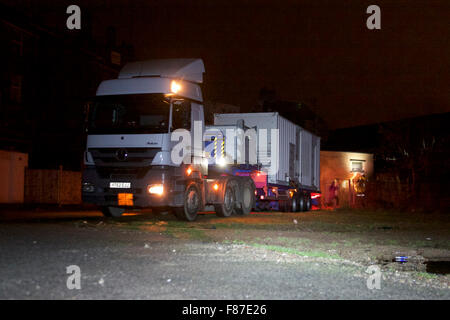 Bold Street, Morecambe, Lancashire, UK. 7th December 2015.  A 110Kva Emergency Generator which has been brought from London, is reversed into position adjacent to the sub station in Bold Street Morecambe   Electricity North West have deployed the Generators in an effort to restore power supplies to part of the Network which has been effected by the flooding from the River Lune which flooded the 33Kva Sub Station Supplying 55,000 homes in Lancaster, Morecambe and the surrounding Areas. Credit:  David Billinge/Alamy Live News Stock Photo