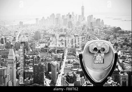 Binoculars over Manhattan Skyline, New York City, USA. Stock Photo