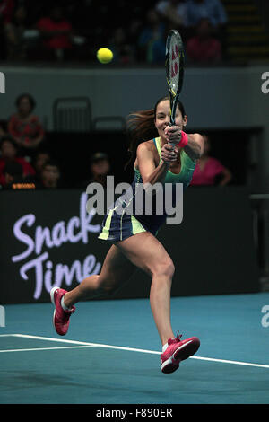 Pasay City, Philippines. 7th Dec, 2015. Obi UAE Royals' player Ana Ivanovic of Serbia returns the ball to Micromax Indian Aces' player Samantha Stosur of Australia during their match in the International Premier Tennis League (IPTL) in Pasay City, the Philippines, Dec. 7, 2015. Stosur won 6-3. Credit:  Rouelle Umali/Xinhua/Alamy Live News Stock Photo