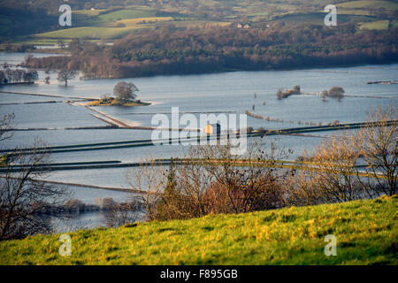 Kendal, Cumbria, UK. 07th Dec, 2015. Aftermath of Storm Desmond. Flooding in the Lyth Valley, near Kendal, Cumbria. This was the scene on Monday 7th.December, two days after the height of Storm Desmond on Saturday 5th.December. Credit:  Stan Pritchard/Alamy Live News Stock Photo