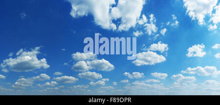 White heap clouds in the blue sky at summer day. Stock Photo
