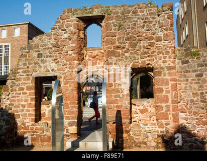 Old Walls - Interior Ruins of Saint Catherine's Almshouses Showing Detail of Entrance and Windows Against Modern Brick. Exeter. Stock Photo