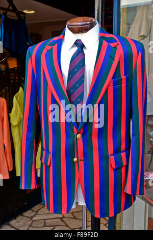 Man casual, unusual, stripes jacket with white shirt and tie, on a mannequin dummy, on display outside a trendy fashion shop Stock Photo