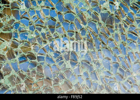 Glass broken into many little pieces Stock Photo