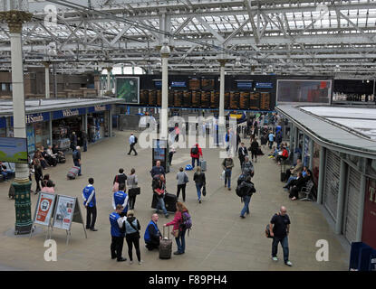 Waverley Railway Station, Edinburgh, Scotland with passengers near departure boards Stock Photo