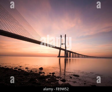 Vasco da Gama Bridge at dawn, Lisbon, Portugal Stock Photo