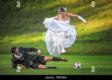 Bride and Groom pose in Red Sox jerseys - Vecoma at the Yellow River