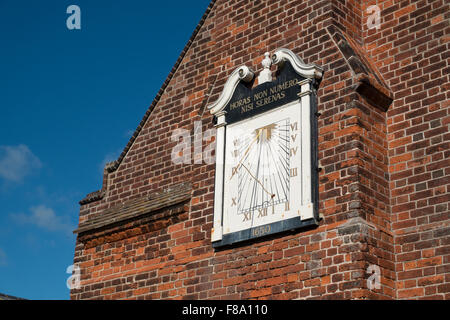 Wall mounted sundail on Moot Hall Aldeburgh Suffolk England Stock Photo