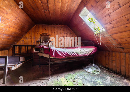 Bedroom of an abandoned house overlooking Laig Bay, on the Isle of Eigg, Small Isles, Inner Hebrides, Scotland Stock Photo