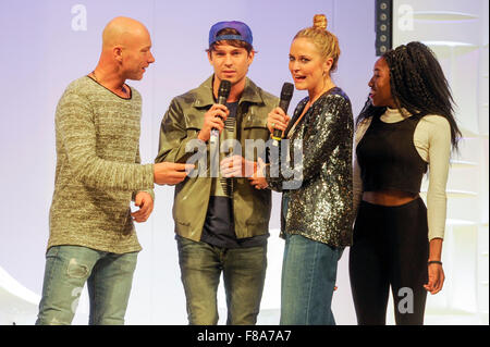 Joey Essex and Antonia O'Brien on stage with two audience members at Clothes Show Live, NEC, Birmingham, UK, 7th December 2015. Joey wears items from his own Fusey fashion range. Credit:  Antony Nettle/Alamy Live News Stock Photo