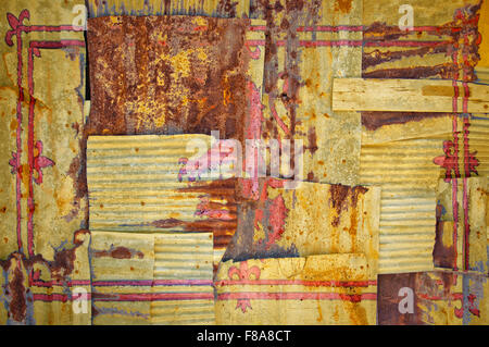 An abstract background image of the flag of Scotland Lion Rampant painted on to rusty corrugated iron sheets overlapping to form Stock Photo