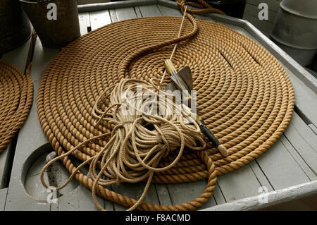 Coiled ropes and log on deck of RCMP St. Roch schooner, Vancouver Maritime Museum, Vancouver, BC, Canada Stock Photo