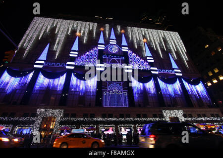 New York, New York, USA. 07th Dec, 2015. Christmas lights set to music adorn the face of Saks Fifth Avenue in New York City across the street from Rockefeller Center. Credit:  Adam Stoltman/Alamy Live News Stock Photo