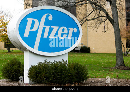 A logo sign outside of a facility occupied by Pfizer, Inc., in Parsippany, New Jersey on November 22, 2015. Stock Photo