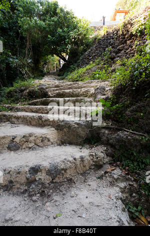 Stone staircase leading on Tembeling pool, Nusa Penida Bali Indonesia Stock Photo