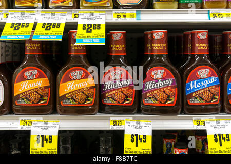 Bottles of barbecue sauces for sale on shelves of a Western Family supermarket in Montana, USA Stock Photo