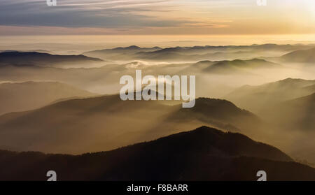 Mystic sunset in the mountains of Romania Stock Photo