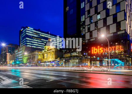 Adelaide, South Australia - August 11, 2015: Ibis Hotel Adelaide with taxis at night. Photo taken in long exposure mode. Stock Photo