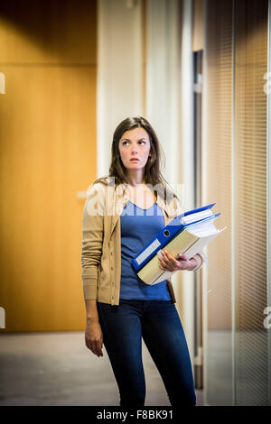 Tired woman at work. Stock Photo