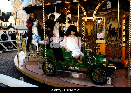 Helsinki, Finland. 07th Dec, 2015. Traditional carousel at Christmas market in Helsinki. On December 8, Helsinki, Finland, sunny day, there is no snow and the temperature 5 degrees Celsius. The market in Helsinki is the largest Christmas market in Finland, the land of Santa Claus. Credit:  Mikhail Olykaynen/Alamy Live News Stock Photo