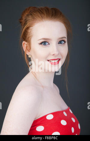 Portrait of redheaded young woman. Stock Photo