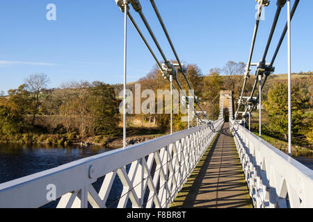 footbridgeLooking along Chainbridge footbridge route of Southern Upland Way across River Tweed. Melrose Scottish Borders Scotland UK Stock Photo