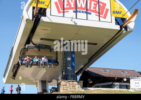 People descending on Butorowy Wierch Chairlift from top station on Gubalowka Mountain, Zakopane, Tatra County, Poland, Europe Stock Photo