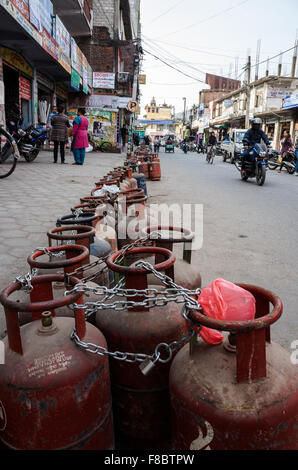 Hetauda, Nepal. 08th Dec, 2015. as the result of ongoing fuel crisis in Nepal due to the blockade of Indo-Nepal borders, people have their gas cylinders in queue with a little hope of getting it filled Credit:  Suman Acharya/Alamy Live News Stock Photo