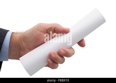 White and blank rolled sheet in the hand of businessman isolated on white background. Stock Photo