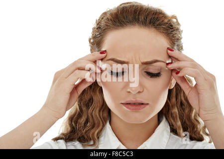 Young businesswoman having a strong headache isolated on white Stock Photo