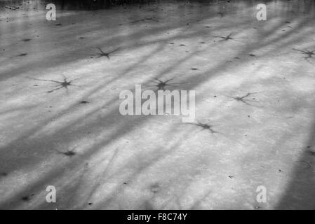 Frozen over water of river with star-shaped patterns on ice Stock Photo