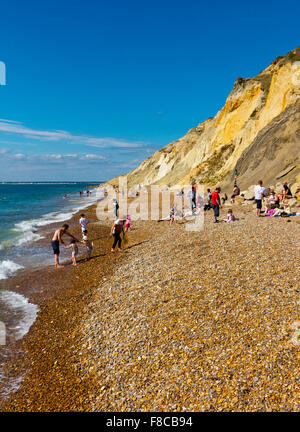 The beach at Alum Bay on the western tip of the Isle of Wight England UK famous for multicoloured sandstone cliffs Stock Photo