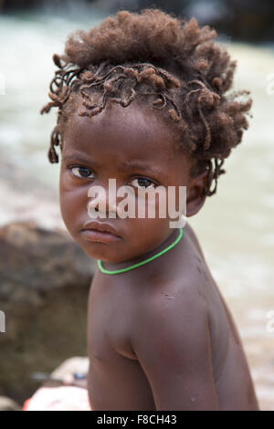 Portrait of a young kids from the Himba tribe, Namibia Stock Photo