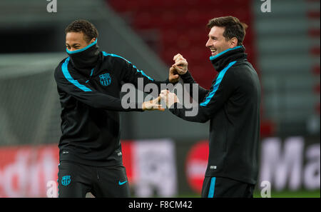 Leverkusen, Germany. 08th Dec, 2015. Barcelona's Lionel Messi (R) and Neymar enjoy themselves during a training session at BayArena in Leverkusen, Germany, 08 December 2015. Bayer Leverkusen will face FC Barcelona in a UEFA Champions League soccer match on 09 December 2015. Photo: GUIDO KIRCHNER/dpa/Alamy Live News Stock Photo