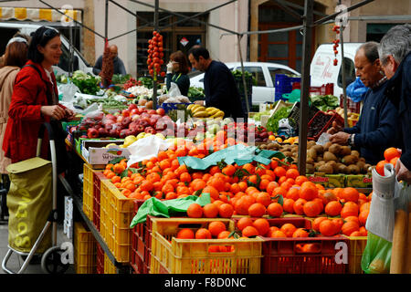 People at the city market of fruits and vegetables Stock Photo