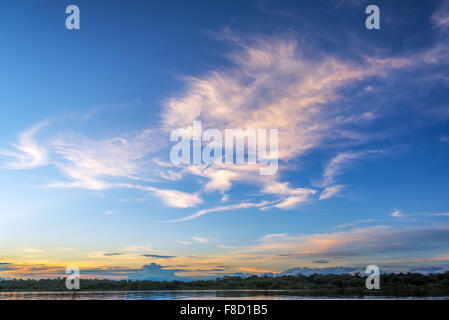 Dramatic sky over the Javari River in the Amazon rain forest in Brazil Stock Photo