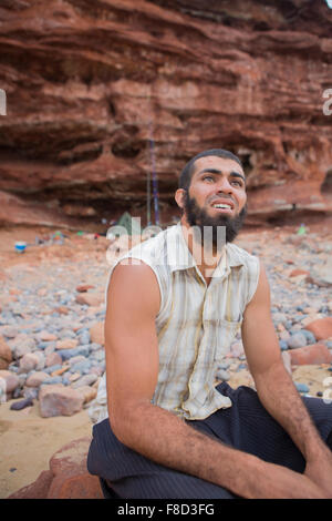 fisherman sitting and camping on the beach, Morocco Stock Photo