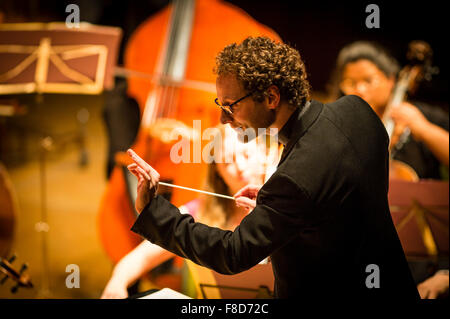 TOBY PURSER, conductor, conducting The Orion Chamber Orchestra, at the 2015 Aberystwyth Music Festival Stock Photo