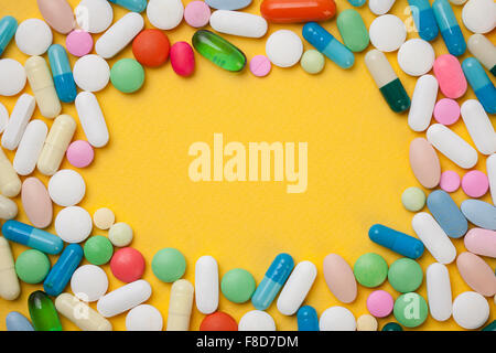 Copy space with a frame made with different types of pills Stock Photo