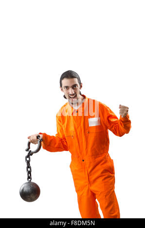 Criminal in orange robe in prison Stock Photo