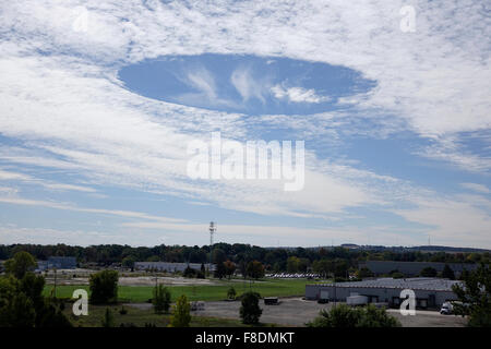 A Circular Fallstreak Cloud Formation Over Woodstock Ontario Canada On October 1st 2015 Sky Punch, Punch Hole Clouds, Sky, Weather Stock Photo