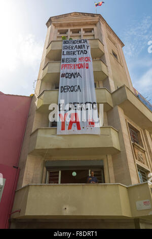 Modern urban residential construction with huge banner, Caracas Stock Photo