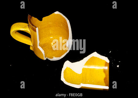 Broken Orange Coffe Cup Stock Photo
