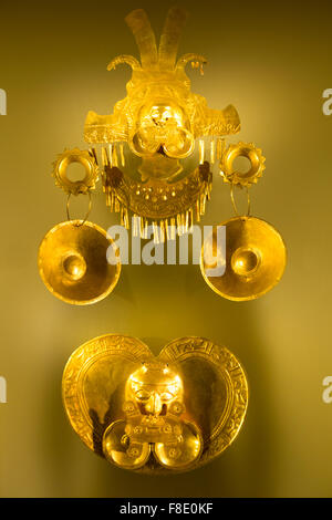Golden object on neutral color background, Colombia Stock Photo
